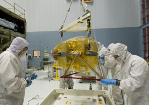 NIRCam is being lowered into a stand where it will rest until it gets mounted in the telescope structure. (Photo: NASA/GSFC)